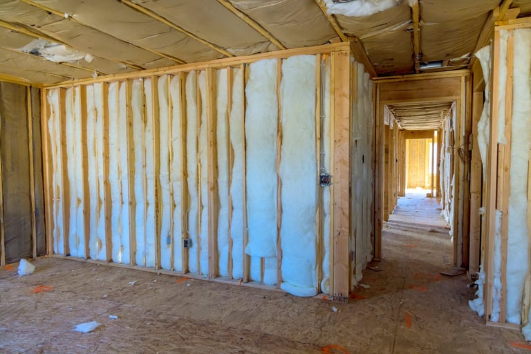 Construction of new residential home involves installation of insulation walls